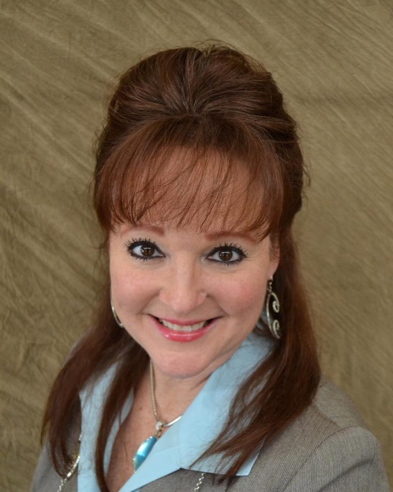 Headshot of Associate Director of Landscape & Integrated Building Services, Bridget Blizzard